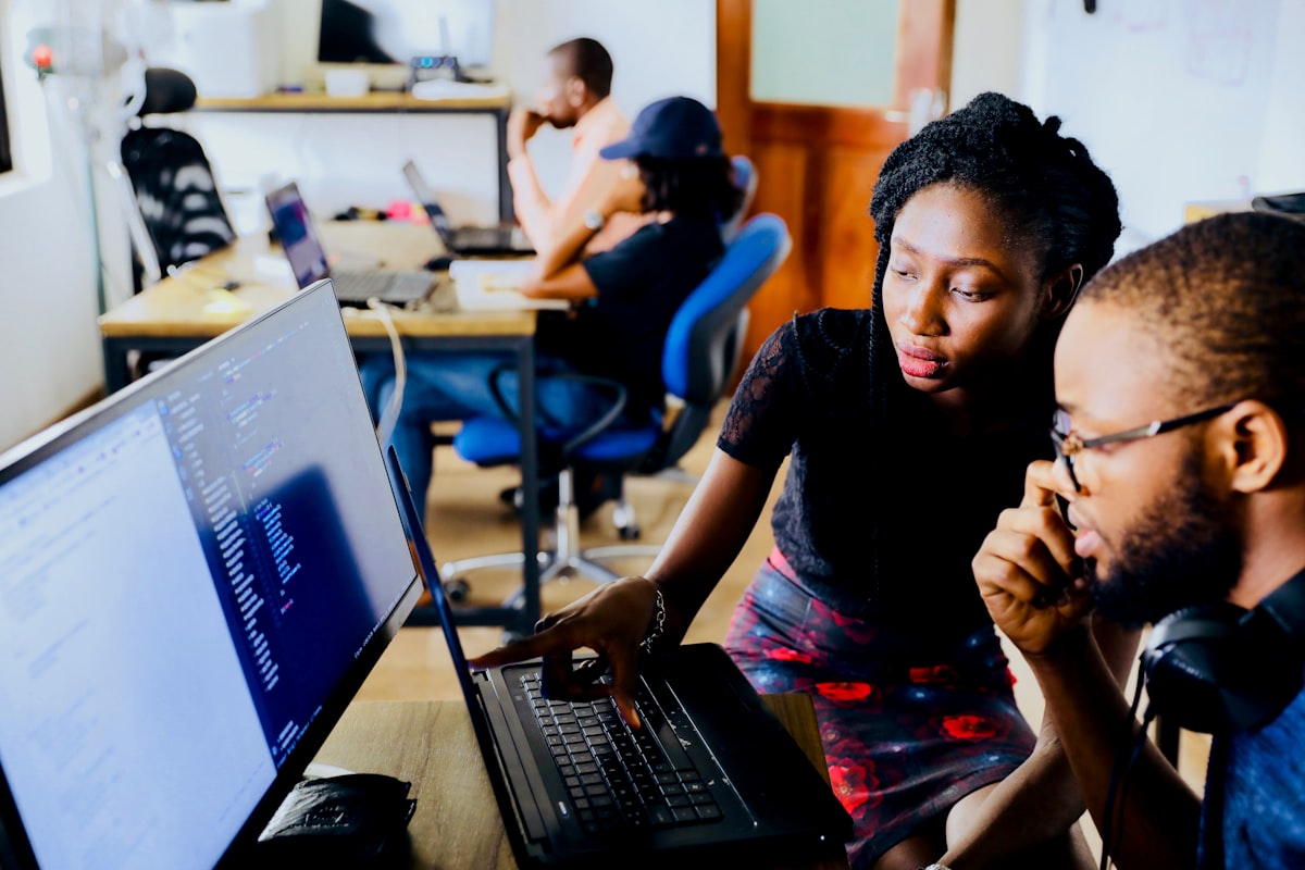 Engineering team analyzing business workflow and operational software requirements