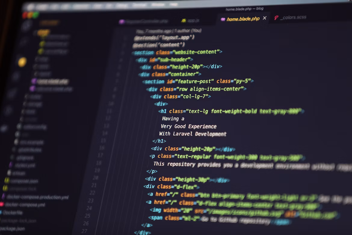 Computer screen displaying web code in modern development environment